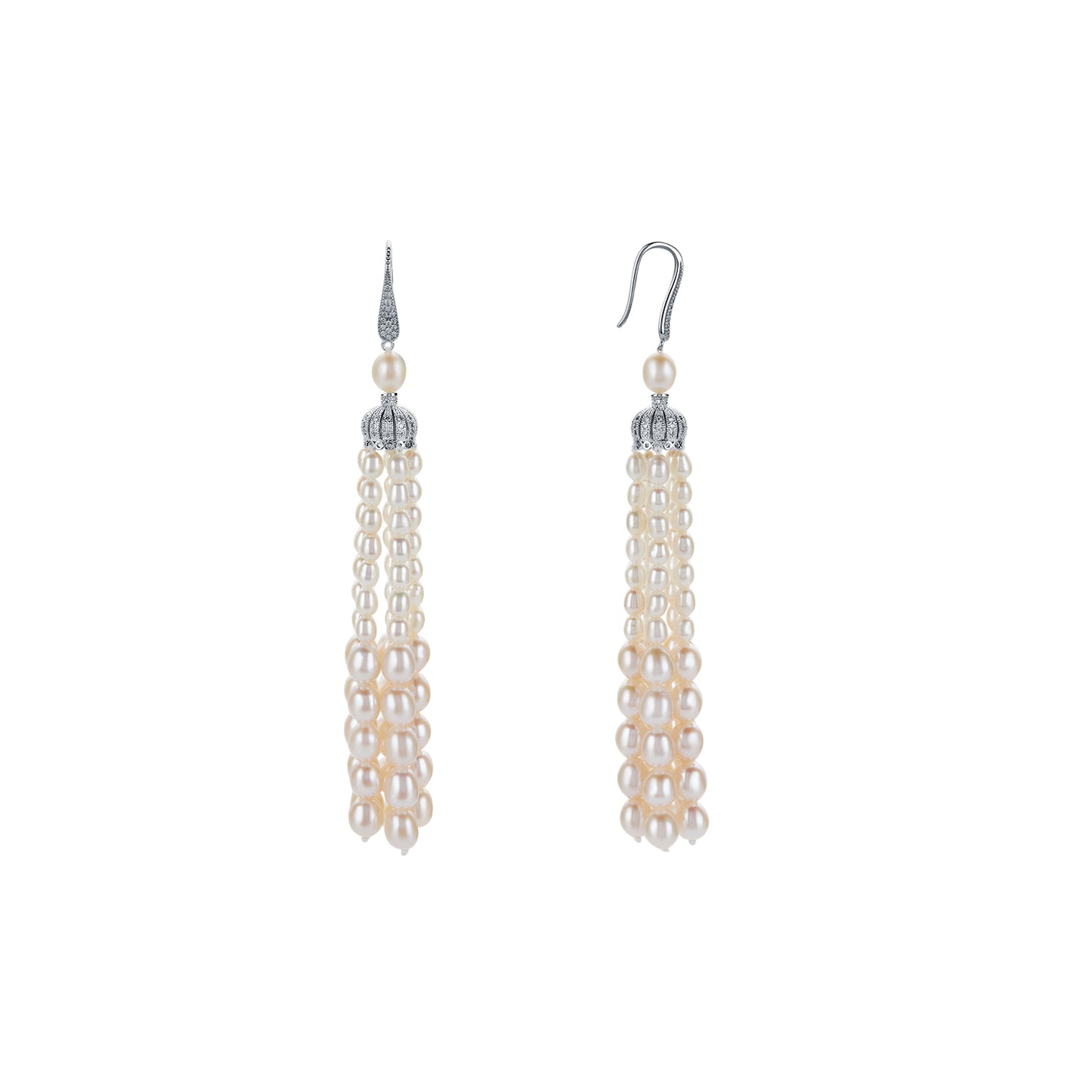 Pair of pearl drop earrings on a white background