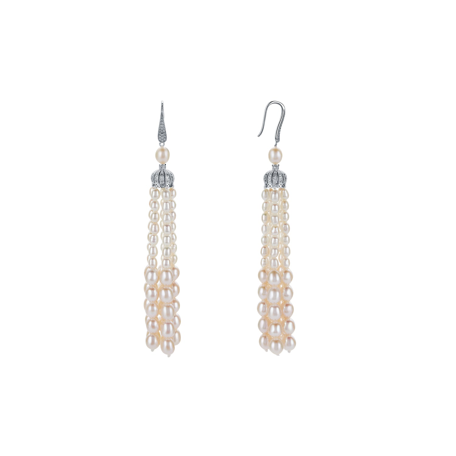 Pair of pearl drop earrings on a white background