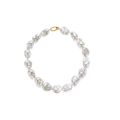 Pearl necklace with very high luster and with a gold clasp on a white background