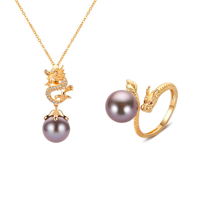 Gold necklace with dragon design and purple pearl pendant, accompanied by a matching gold ring on a white background.