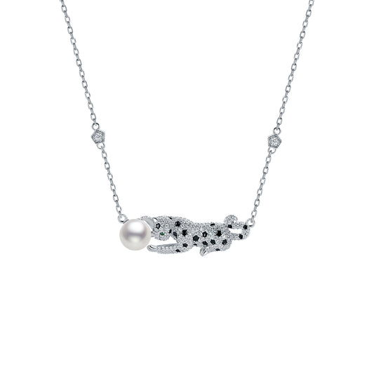 Necklace with a leopard pendant featuring a pearl on a white background