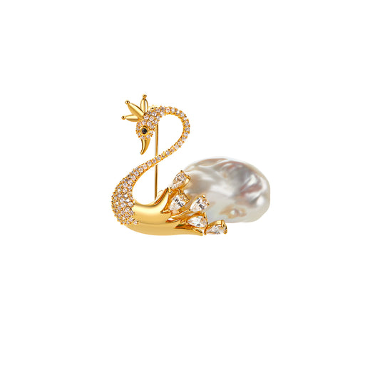Gold swan-shaped earring with pearl on a white background