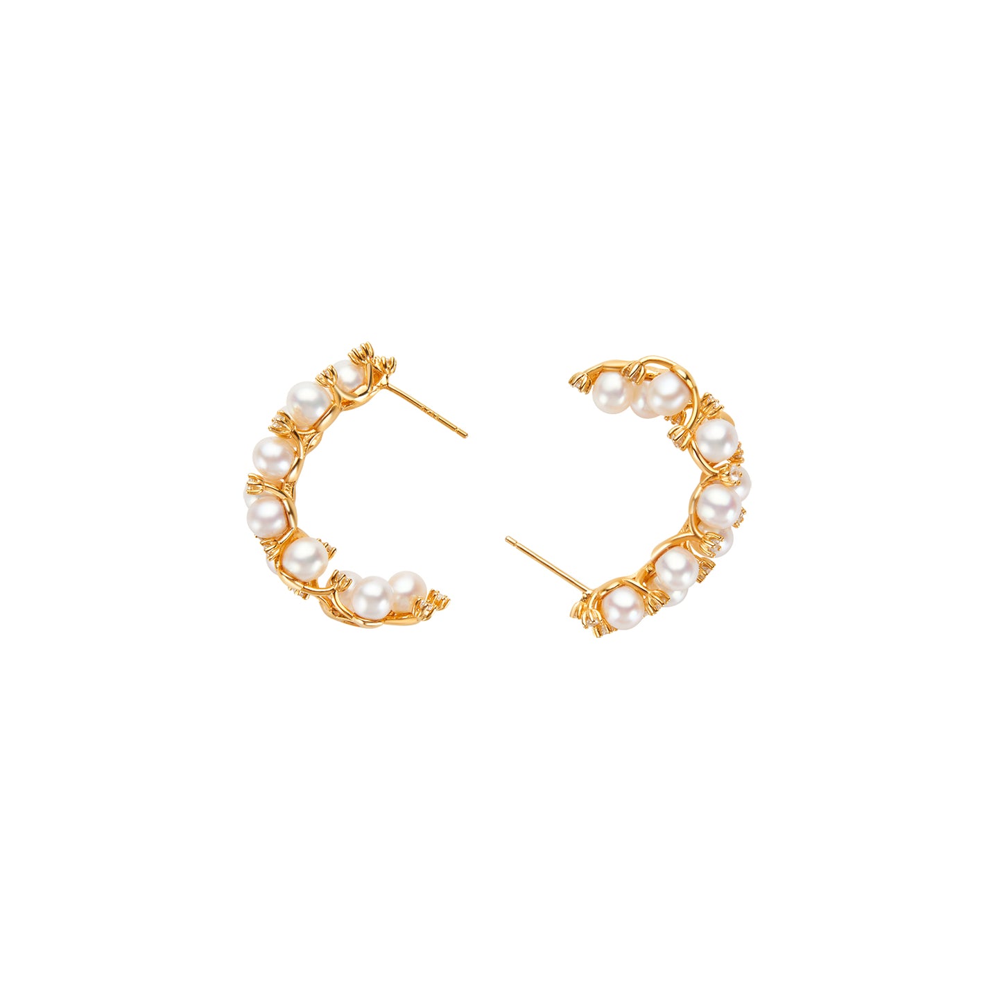 Gold hoop earrings with pearls on a white background