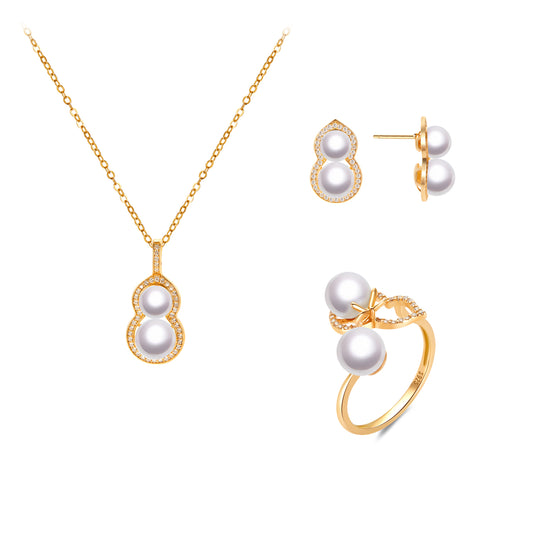 Pearl jewelry set with necklace, earrings, and ring on a white background