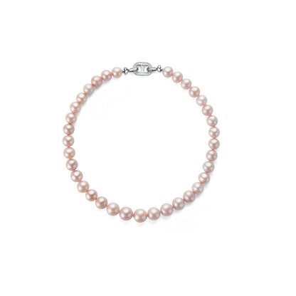 Pearl necklace with silver clasp on a white background