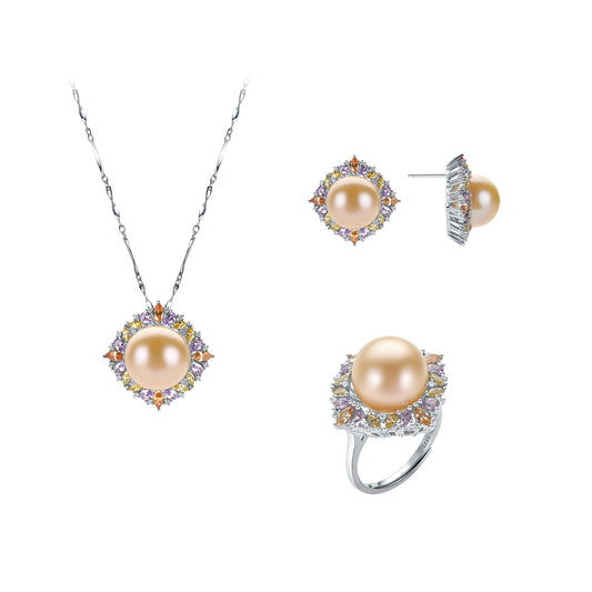 Pearl jewelry set with necklace, ring, and earrings on a white background