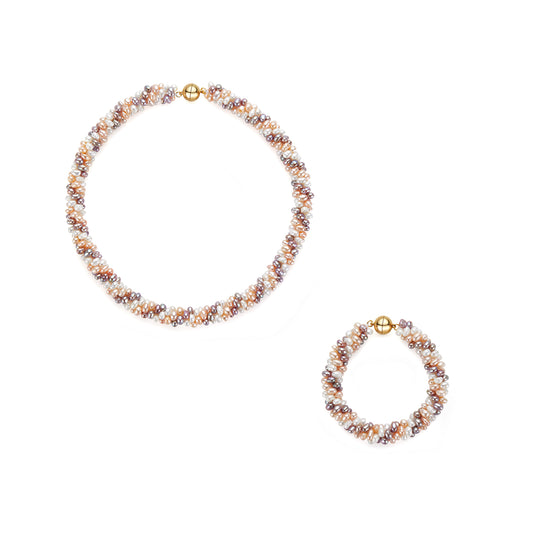 Pearl necklace and bracelet set on a white background