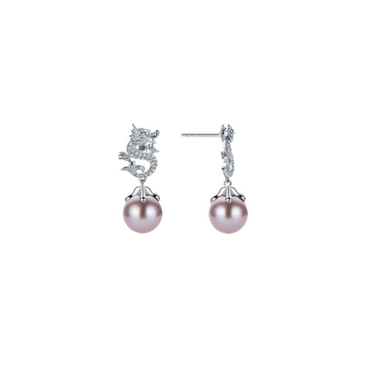 Pair of dragon design purple pearl earrings with silver fixtures on a white background