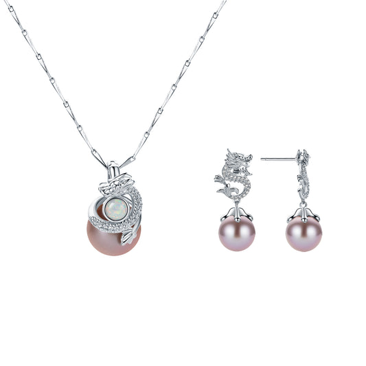 Pearl dragon design necklace and earrings set on a white background