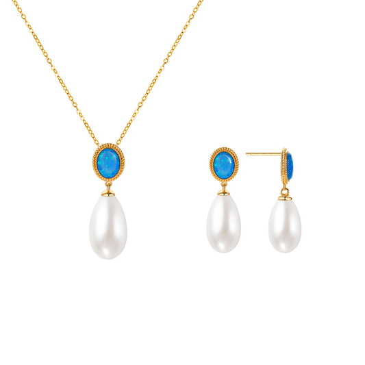 Pearl necklace and earrings with blue gemstones on a white background