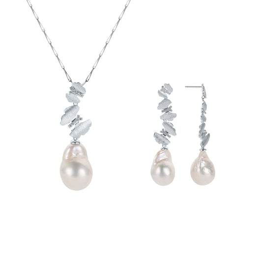 Pearl necklace and earrings set with butterflies accent on a white background
