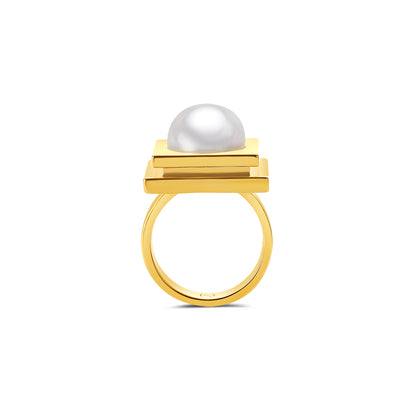 Gold ring with a pearl on a white background