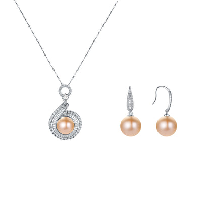Pearl necklace and earrings set on a white background