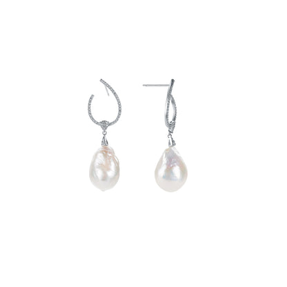 Pearl drop earrings on a white background