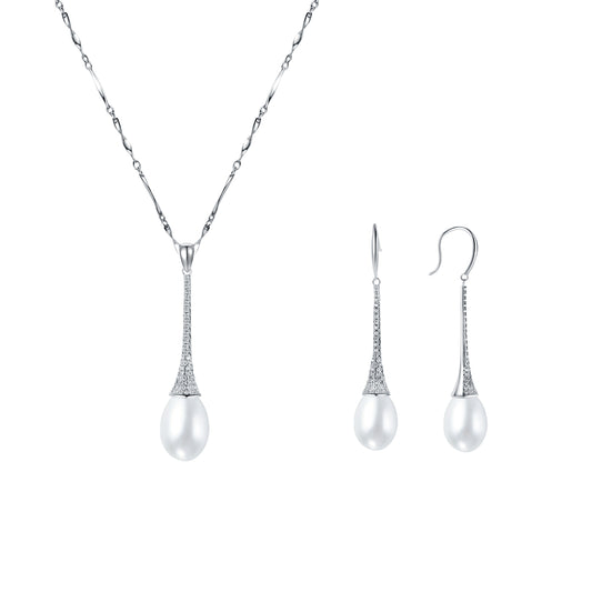 Pearl necklace and earrings set on a white background