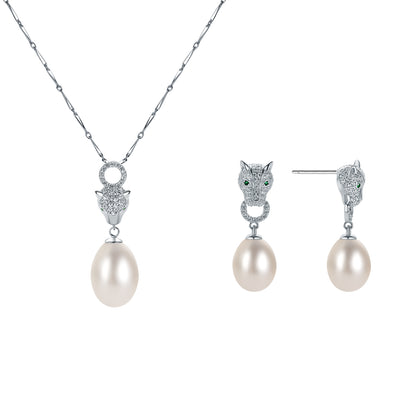 Pearl necklace and earrings with silver leopard-shaped pendants on a white background
